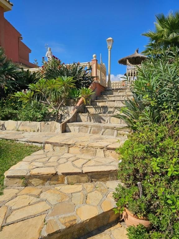 Landscaped garden steps at Villa Andalucía in Mijas Costa