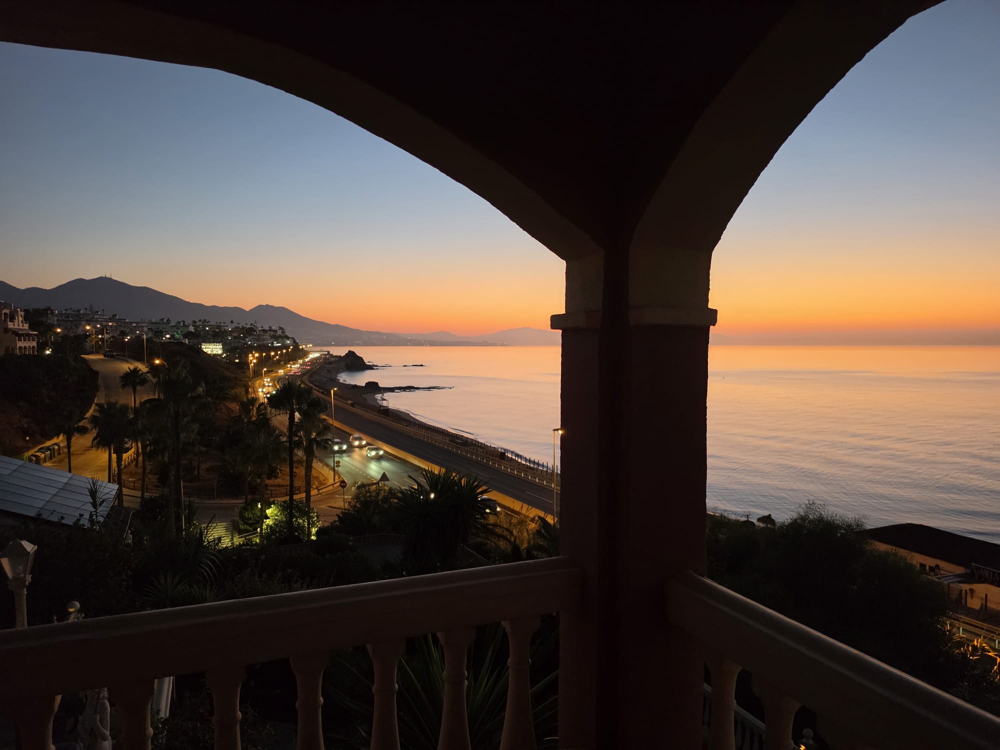 Mediterranean sunset from Villa Andalucia arches